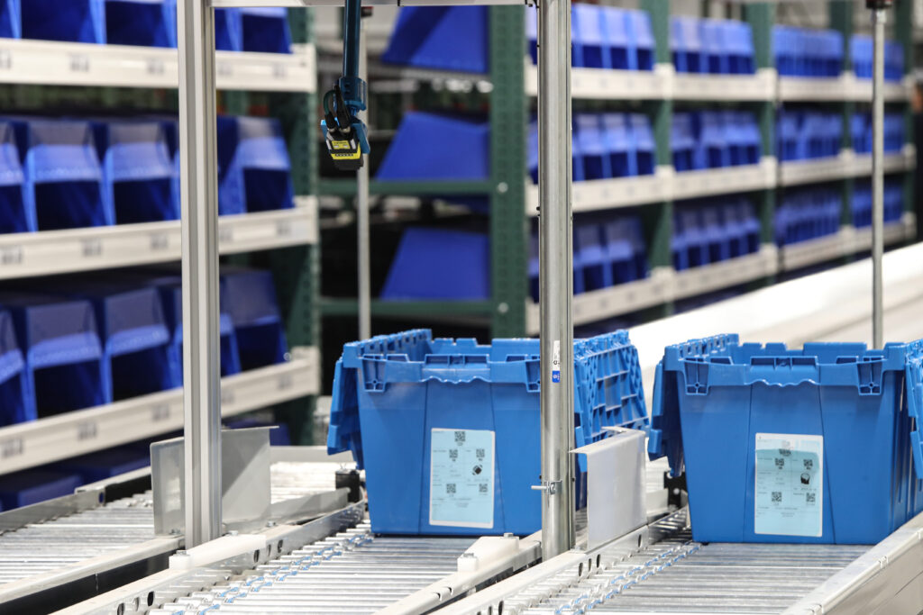 Powered Conveyor for Totes - Apex Companies